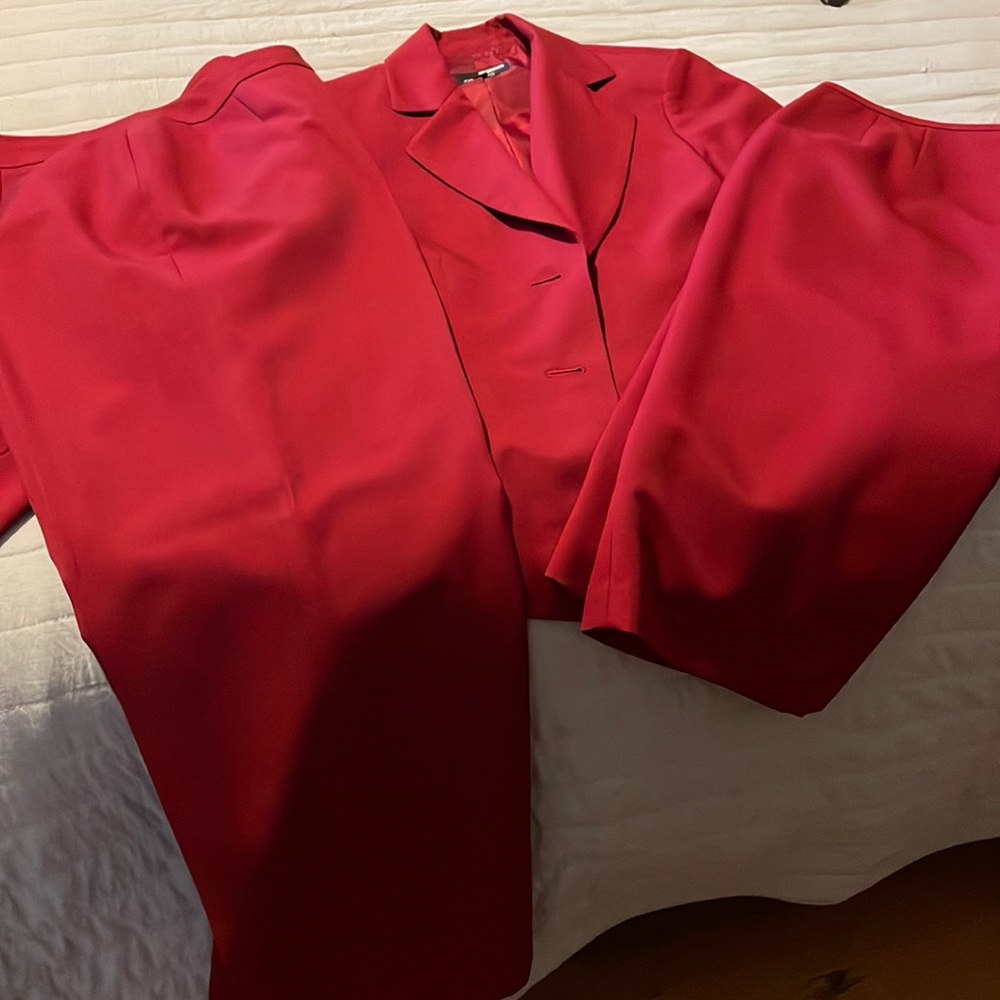 Dark red 3 piece suite.  jacket with Long pencil skirt and wide leg slacks.